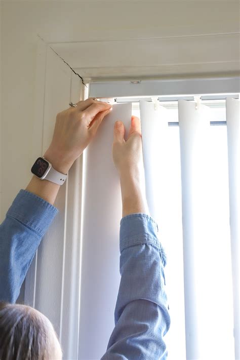 how to remove vertical blinds from metal brackets|taking down vertical blinds video.